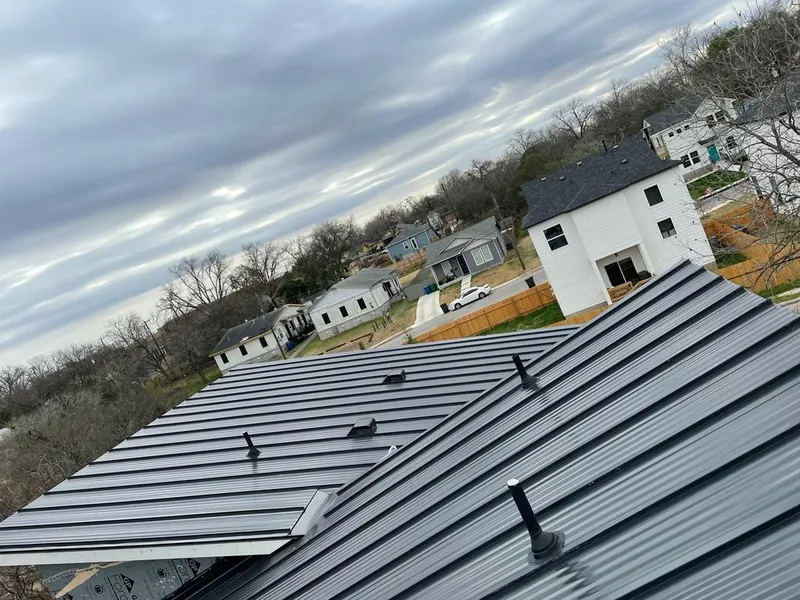 Standing seam metal roof panels with vents for Skylight Repair in Navasota